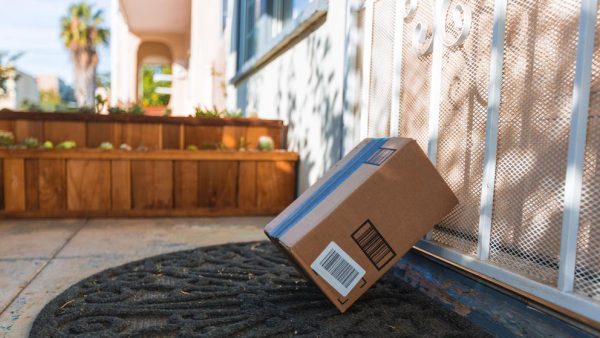 Cardboard package delivery at front door during the holiday season